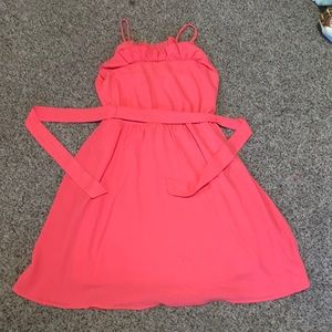Pinkish orange flowey dress.